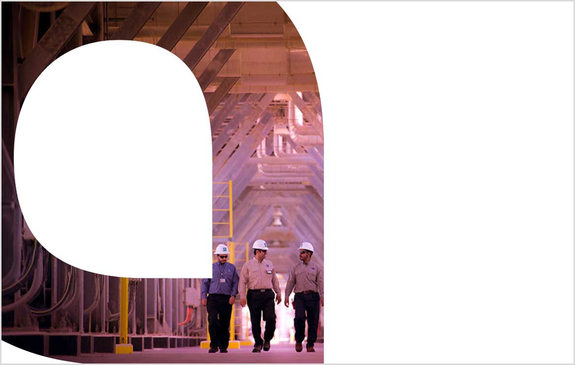 Aramco employees – walking – gas processing facility – Saudi Arabia